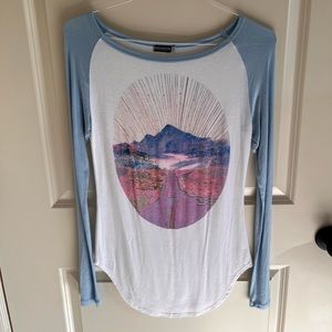 Long sleeve, baseball style, thin shirt.
